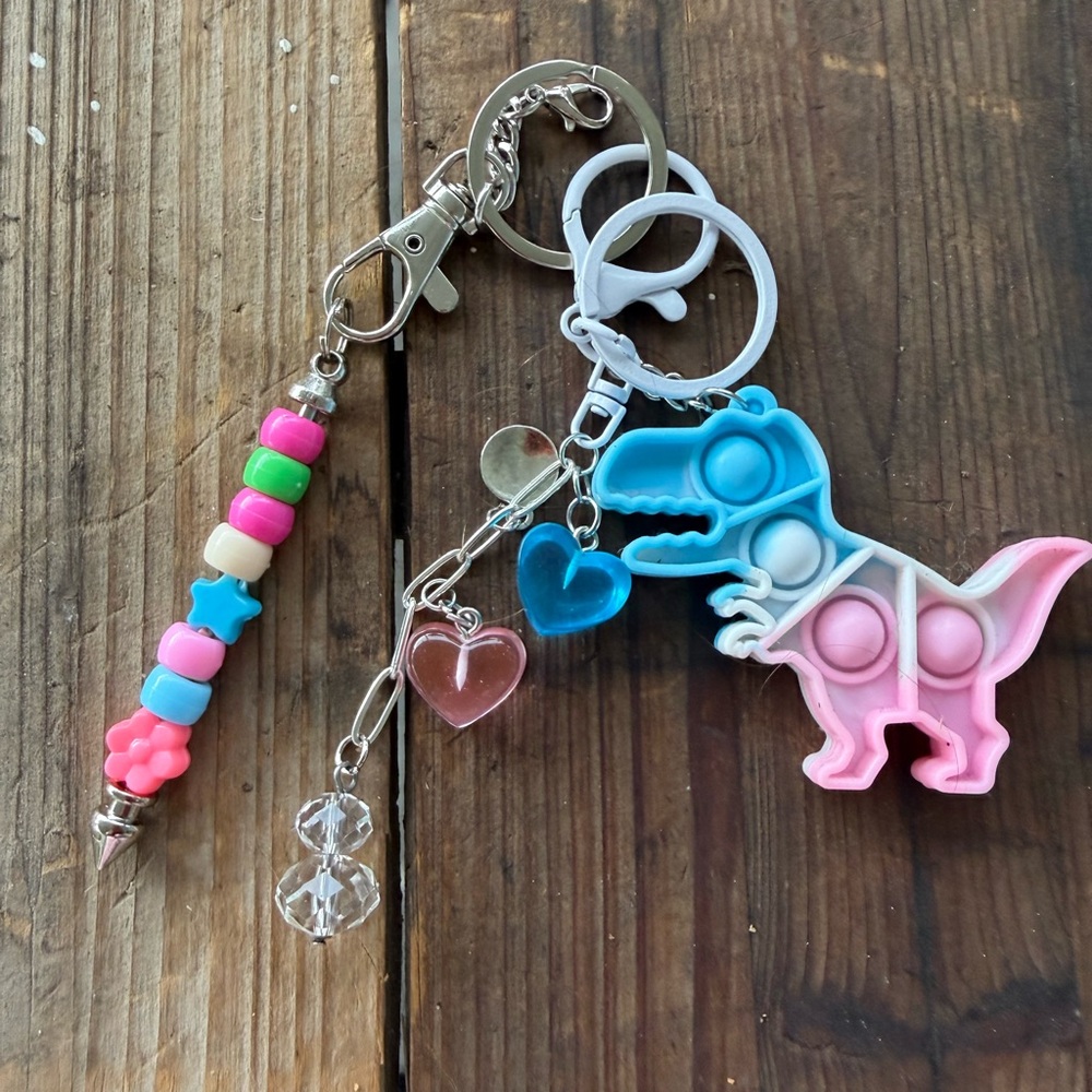 Dinosaur pop it blue and  pink puffy hearts silver charm hope  sh charm key fob